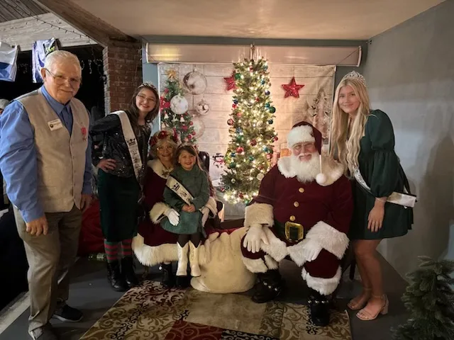 Families with Santa and the Chamber court at Williston Winter Wonderland